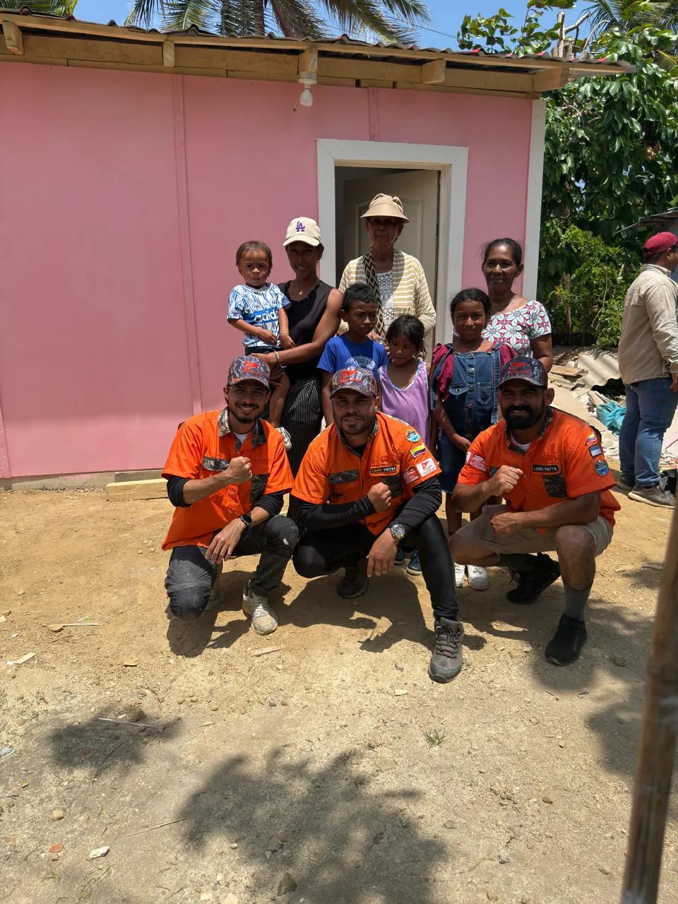 Family and volunteers celebrating
